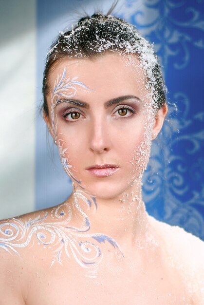 Portrait of the girl with art winter make up like Snow Queen