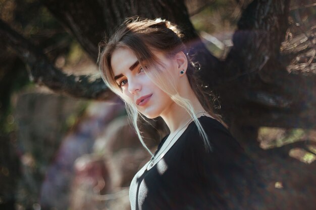 Portrait of a girl with beautiful illumination from the lens