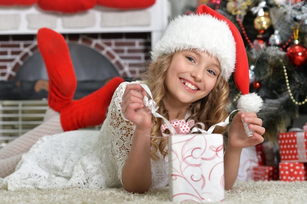 Portrait of a girl with Christmas present