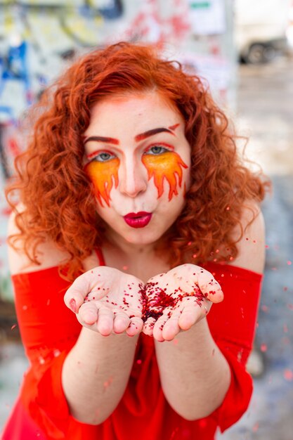 Portrait of a girl with a fiery makeup