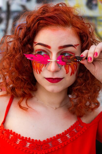 Portrait of a girl with a fiery makeup