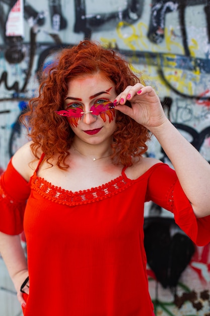 Portrait of a girl with a fiery makeup