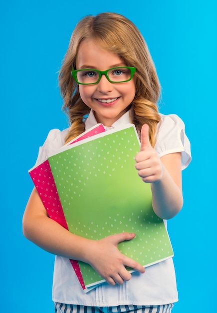 Portrait of a girl with glasses isolated