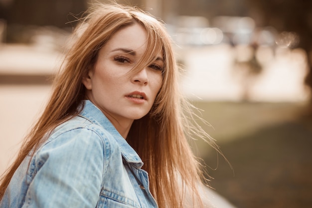 Portrait of a girl with long hair. copy space