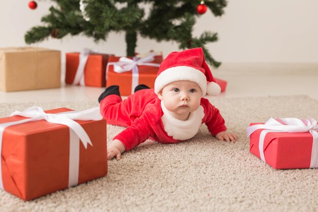 Portrait of girl with red christmas tree