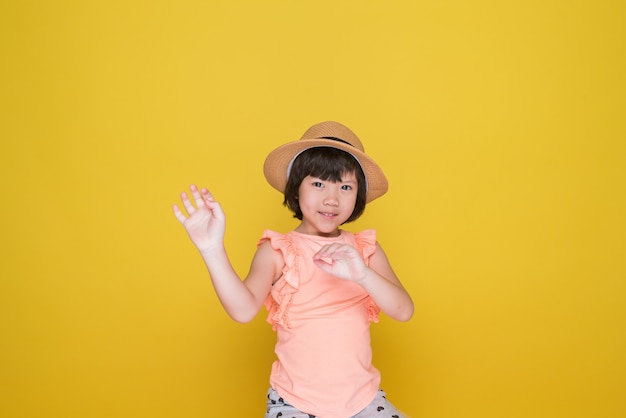 Portrait girl on yellow background asian woman