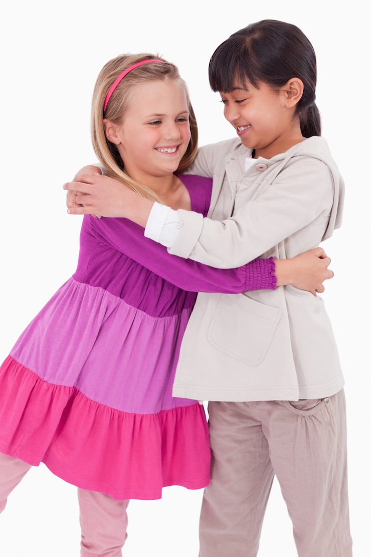 Portrait of girls hugging