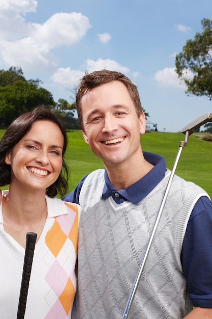 portrait golf course and couple with hug training smile and grass field with embrace recreation and health face man and woman with wellness activity and happiness with fitness routine or hobby