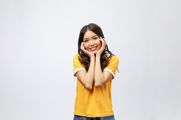 Portrait of good looking woman with long black hair