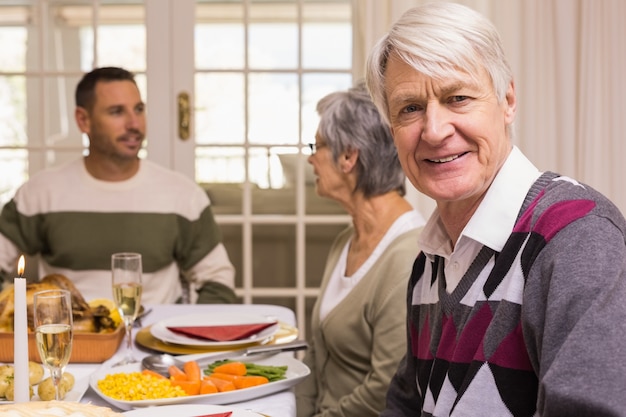 Portrait of a grandfather during christmas dinner