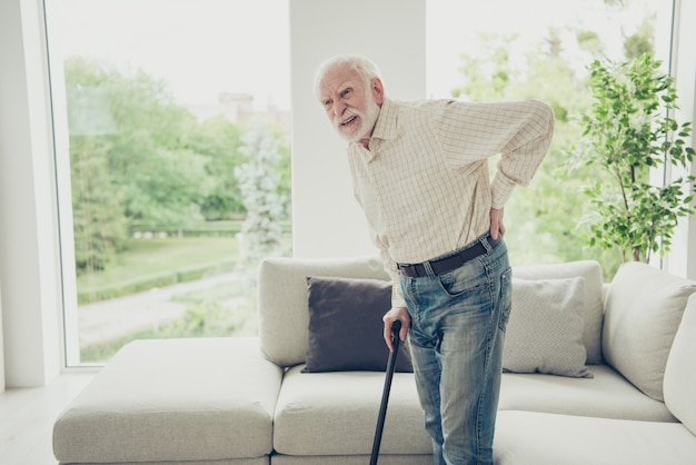 Portrait of a grandparent in the living room