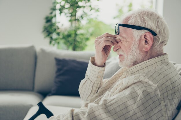 Portrait of a grandparent in the living room