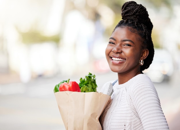 Photo portrait grocery shopping and black woman with a bag discount and happiness with healthy products items and retail face female person and shopper with sale produce and customer with nutrition