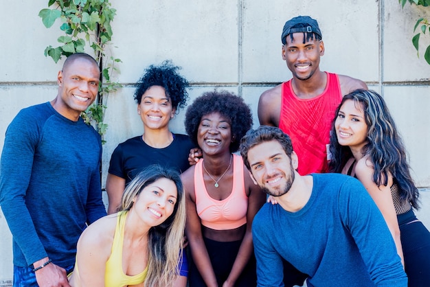 Portrait of a group of runners smiling at camera. horizontal framing