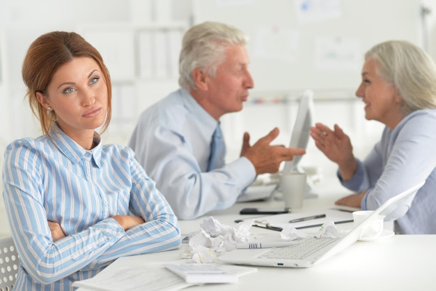 Portrait of group of successful business people in modern office