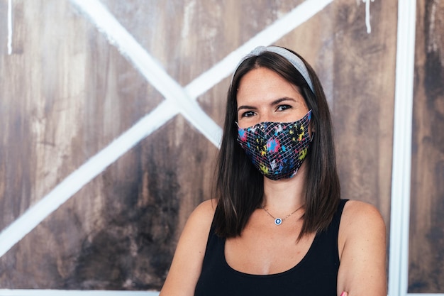 Portrait of a hairdresser with facial mask