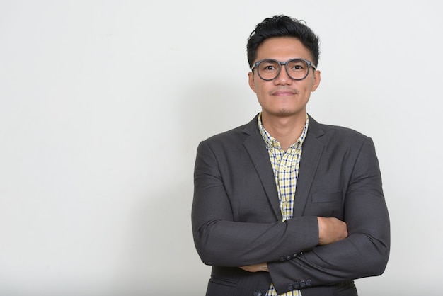 Portrait of handsome Asian businessman in suit