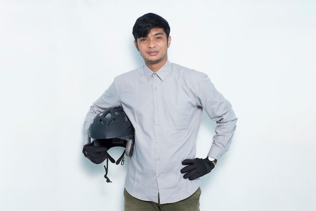 Portrait handsome asian man with a motorcycle waring helmet on white background