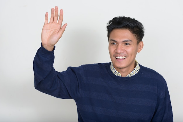 Portrait of handsome Asian man with sweater