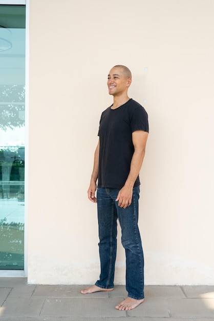 Portrait of handsome bald man wearing tshirt