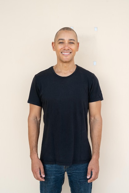 Portrait of handsome bald man wearing tshirt