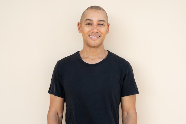 Portrait of handsome bald man wearing tshirt