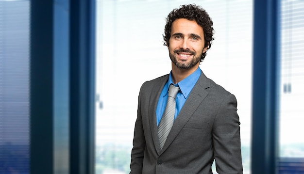 Portrait of a handsome businessman in a modern office