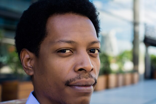 Portrait of an handsome businessman outdoor.