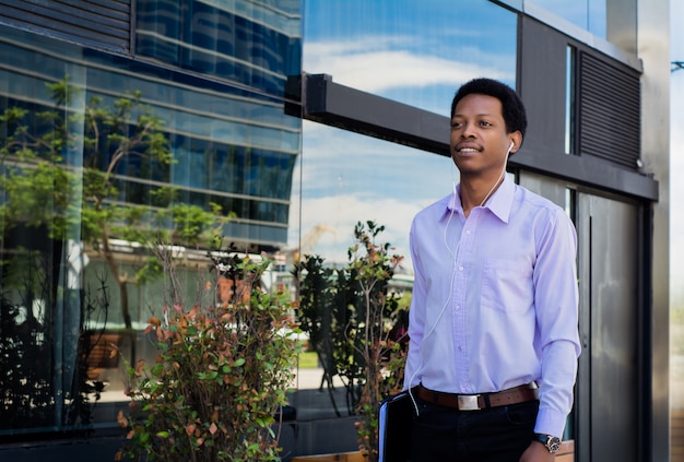 Portrait of an handsome businessman outdoor.