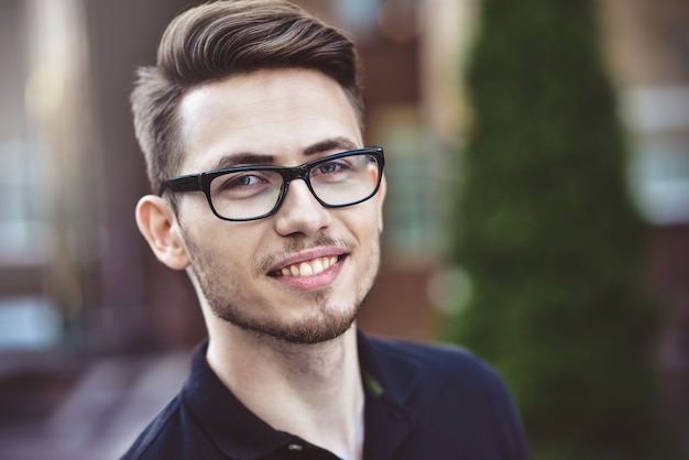 Portrait of handsome caucasian man st street