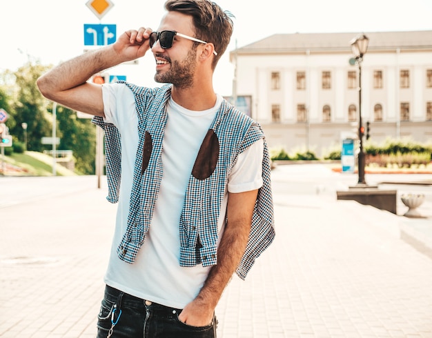 Portrait of handsome confident stylish hipster lambersexual model