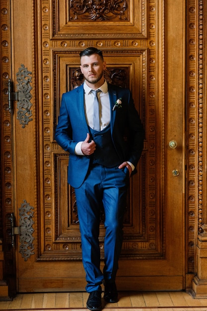 Portrait of a handsome groom on his wedding celebration.