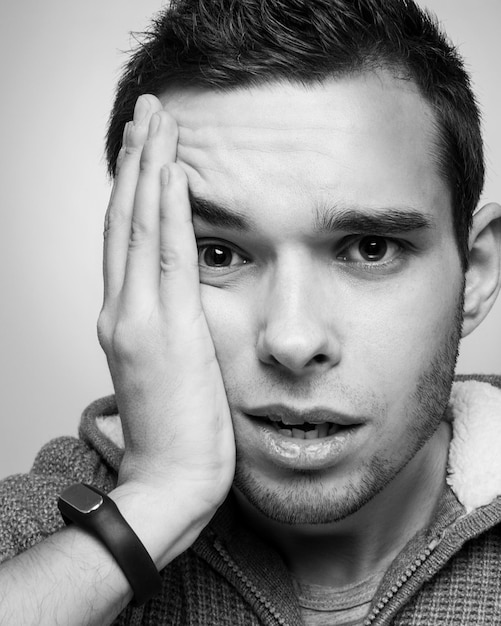 Portrait of a handsome guy with glasses Poor eyesight Vision correction Black and white photography