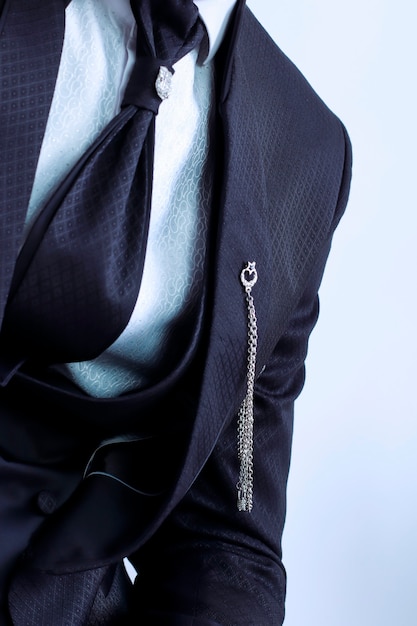 Portrait of handsome man in black suit