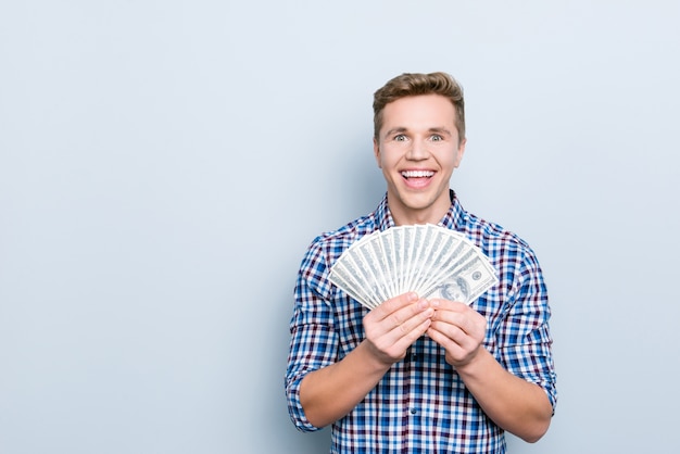 Portrait of handsome man with banknotes