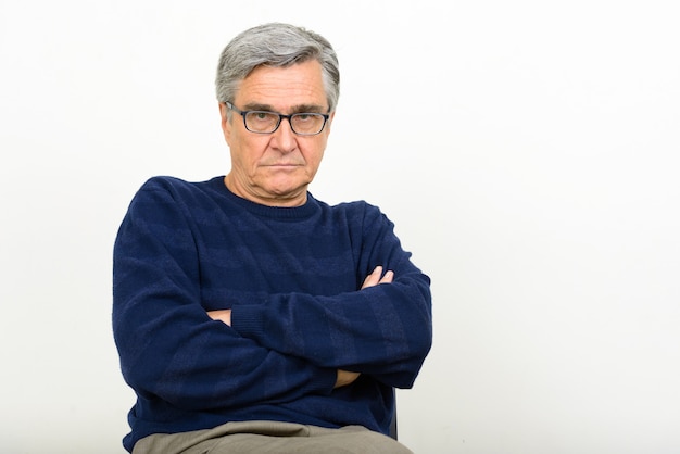 Portrait of handsome senior man with eyeglasses