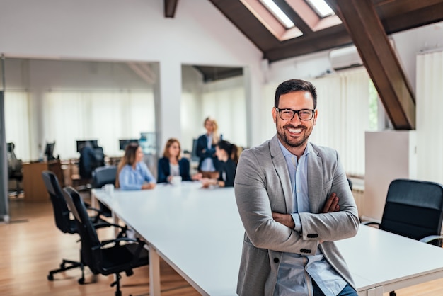 Portrait of handsome smiling businessman.