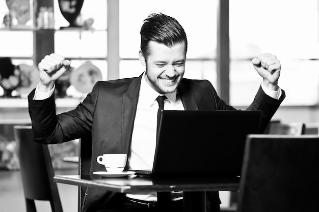 Portrait of a handsome yang businessman in office.