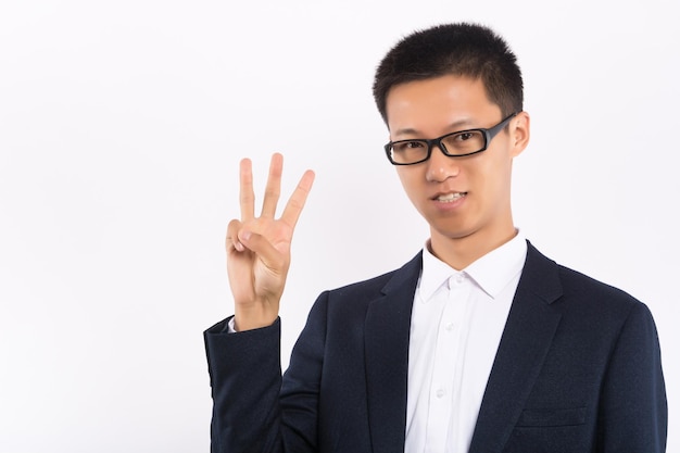 Portrait of handsome young asian man dubting