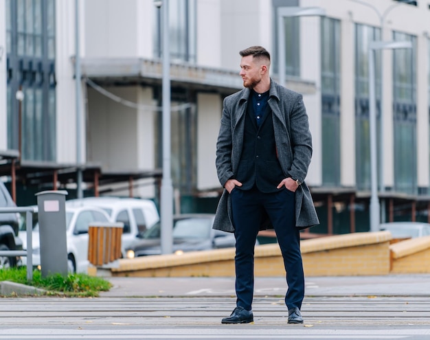 Premium Photo | Portrait of a handsome young businessman walking cross ...