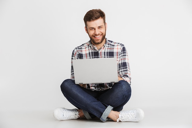 portrait of a handsome young man in plaid shirt