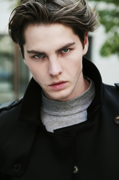 portrait of handsome young man wearing jacket