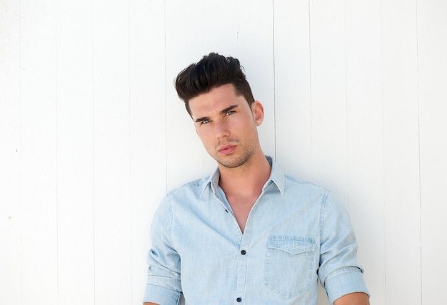 Portrait of a handsome young man on white background