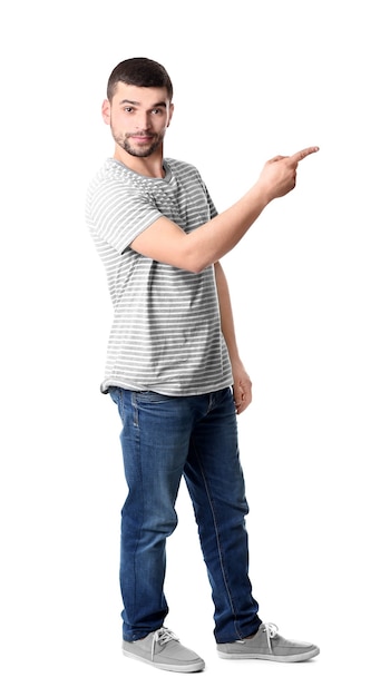 Portrait of handsome young man on white surface