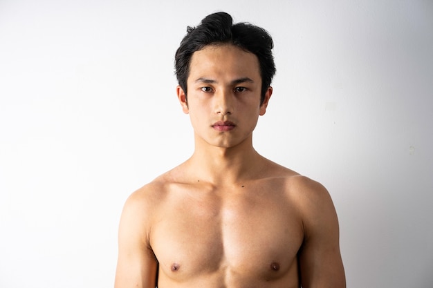 Portrait of handsome young man with clean muscles and skin