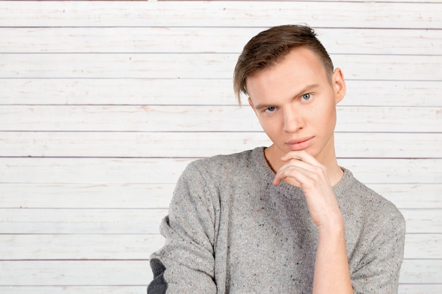 Portrait of handsome young thoughtful man