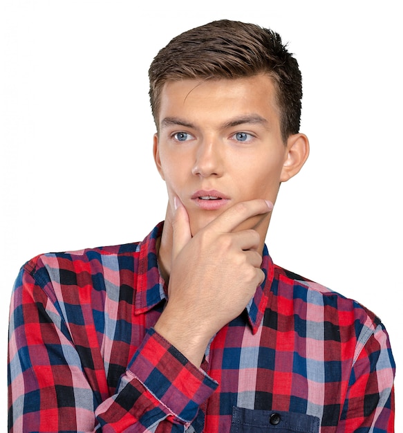 Portrait of handsome young thoughtful man