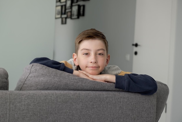 Portrait of Happy Adorable Baby Boy on the Bed in his Room