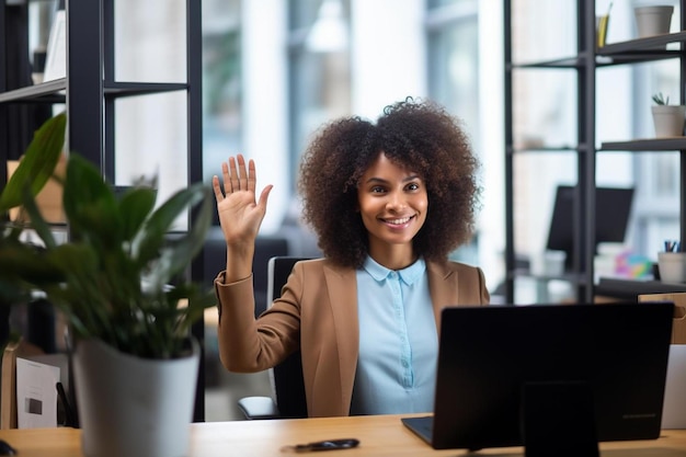 Photo portrait of happy african american casual businesswoman having video call and waving hand in office