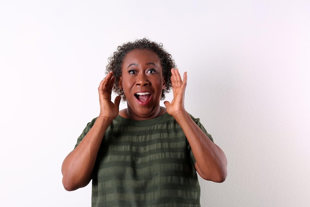 Portrait of happy AfricanAmerican woman on white background